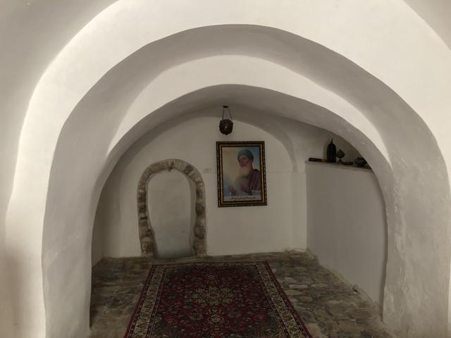 The site’s significance dates back to the 1200s, when the Sufi mystic Baba Farid visited Jerusalem and lived in a waqf property here, praying in isolation for 40 days in a cave on the premises. A large portrait of the saint still guards the entrance to this cave. (Mimi Choudhury) The site’s significance dates back to the 1200s, when the Sufi mystic Baba Farid visited Jerusalem and lived in a waqf property here, praying in isolation for 40 days in a cave on the premises. A large portrait of the saint still guards the entrance to this cave. (Mimi Choudhury)
