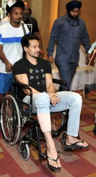 Actor Tiger Shroff with his leg wrapped in crape bandage, after he was hurt during a practise. (Dheeraj Dhawan/HT Photo)