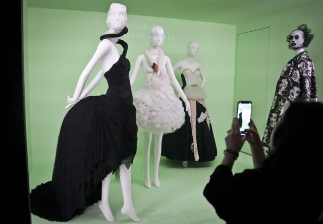 Fashion from Gucci, from left, Givenchy, Moshino and Marc Jacobs appear at a press preview in the Metropolitan Museum of Art's Costume Institute exhibit, titled, "Camp: Notes on Fashion," Monday, May 6, 2019, in New York. (AP Photo/Bebeto Matthews) (AP) Fashion from Gucci, from left, Givenchy, Moshino and Marc Jacobs appear at a press preview in the Metropolitan Museum of Art's Costume Institute exhibit, titled, "Camp: Notes on Fashion," Monday, May 6, 2019, in New York. (AP Photo/Bebeto Matthews) (AP)