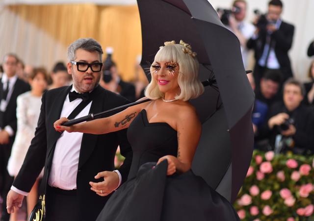 Lady Gaga wore four outfits to the Met Gala, stripping each outfit off to  reveal the next before ending with a risque lingerie