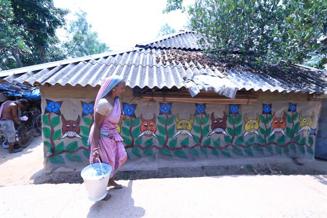 Patachitra adorns a mud hut at Naya village. (HT Photo)