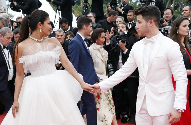 Priyanka Chopra and Nick Jonas pose for the photographers. (REUTERS) Priyanka Chopra and Nick Jonas pose for the photographers. (REUTERS)