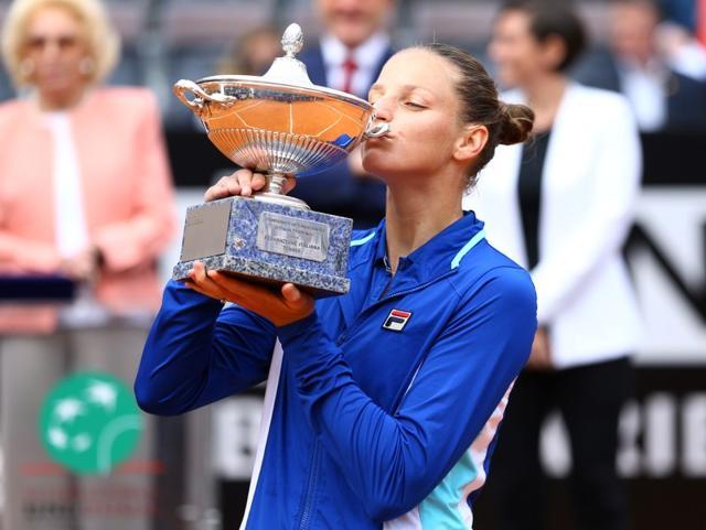 Karolina Pliskova kisses a trophy as she celebrates winning the final against Johanna Konta. (REUTERS) Karolina Pliskova kisses a trophy as she celebrates winning the final against Johanna Konta. (REUTERS)
