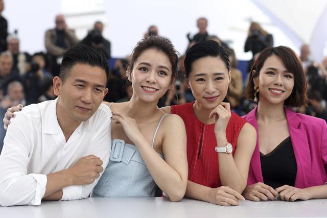Director Midi Z, from left, actresses Vivian Sung Yun-hua, Wu Ke-xi and Hsia Yu-chiao pose for photographers at the photo call for the film 'Nina Wu'' at the 72nd international film festival, Cannes, southern France, Tuesday, May 21. (AP) Director Midi Z, from left, actresses Vivian Sung Yun-hua, Wu Ke-xi and Hsia Yu-chiao pose for photographers at the photo call for the film 'Nina Wu'' at the 72nd international film festival, Cannes, southern France, Tuesday, May 21. (AP)