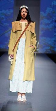 Model in Shruti Sancheti ensemble. The duster jacket is made of jute linen. The natural fabric lets you breathe in summers and can be worn alone as a dress. In winters, it can be used as a layer. Beige being a neutral colour can be used in every season. Model in Shruti Sancheti ensemble. The duster jacket is made of jute linen. The natural fabric lets you breathe in summers and can be worn alone as a dress. In winters, it can be used as a layer. Beige being a neutral colour can be used in every season.