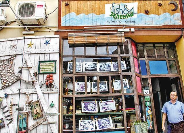 Tucked into a quiet street, the Fish & Zeleniš restaurant boasts quirky décor, murals on walls and trinket-filled shelves (Kalpana Sunder) Tucked into a quiet street, the Fish & Zeleniš restaurant boasts quirky décor, murals on walls and trinket-filled shelves (Kalpana Sunder)