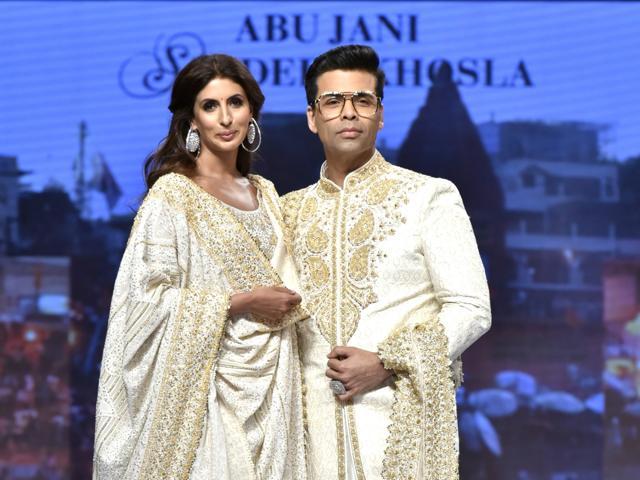 Author Shweta Bachchan Nanda and filmmaker Karan Johar showcase a creation of fashion designer duo Abu Jani and Sandeep Khosla. (IANS) Author Shweta Bachchan Nanda and filmmaker Karan Johar showcase a creation of fashion designer duo Abu Jani and Sandeep Khosla. (IANS)