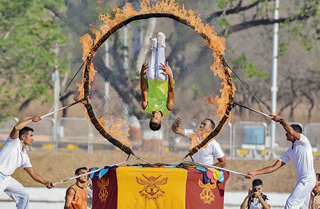 Cadets display various skills during the tattoo show organised at the convocation ceremony of 136th National Defence Academy (NDA) course on Wednesday. (Milind Saurkar/HT Photo)