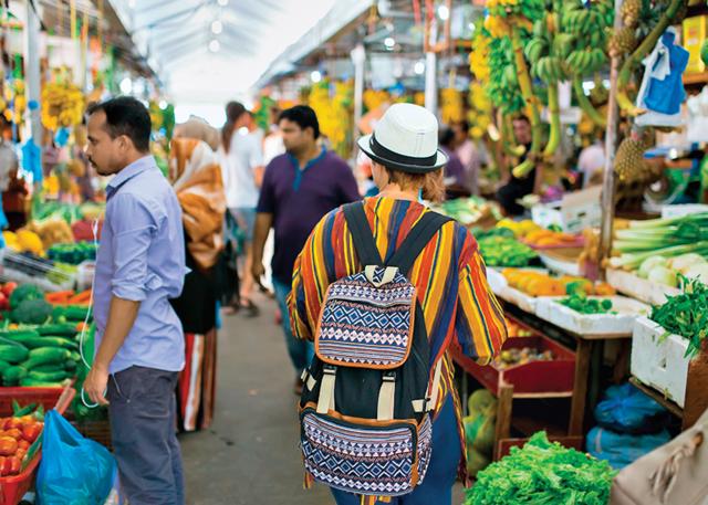 Exploring local sights, like this fresh fruits and vegetables market in Male, is a great way to bond with teenage children (Kalyani Chawla ) Exploring local sights, like this fresh fruits and vegetables market in Male, is a great way to bond with teenage children (Kalyani Chawla )