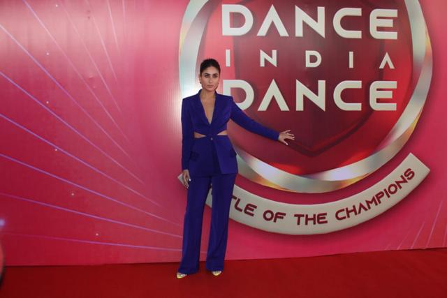 Kareena Kapoor poses by the logo of Dance India Dance: Battle of the Champions, in which she will feature as a judge. Kareena Kapoor poses by the logo of Dance India Dance: Battle of the Champions, in which she will feature as a judge.