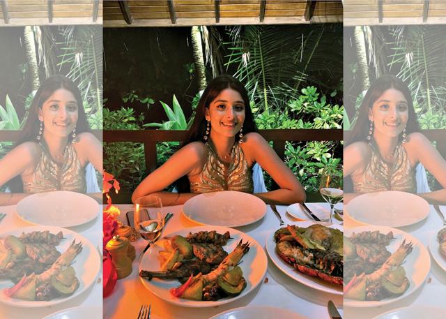 The writer’s daughter Tahira Tara Chawla enjoying delicious seafood (Kalyani Chawla ) The writer’s daughter Tahira Tara Chawla enjoying delicious seafood (Kalyani Chawla )