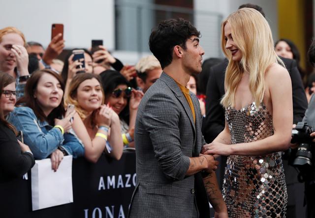 Sophie Turner and Joe Jonas arrive at the premiere for the documentary Chasing Happiness. (REUTERS) Sophie Turner and Joe Jonas arrive at the premiere for the documentary Chasing Happiness. (REUTERS)
