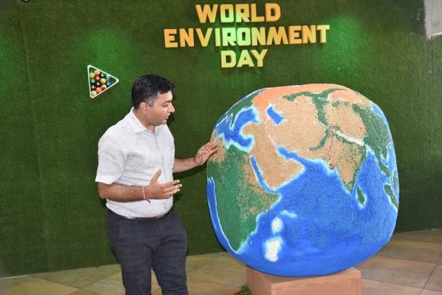 The Universal Barbecue Restaurant in Hinjewadi made a replica of the world with pulses, grains to spread the message of saving the world. (HT PHOTO)