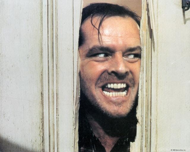 Jack Nicholson peering through axed in door in the film 'The Shining', 1980. (Getty Images) Jack Nicholson peering through axed in door in the film 'The Shining', 1980. (Getty Images)