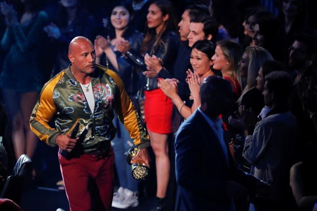 Actor Dwayne Johnson receives the Generation Award. (REUTERS) Actor Dwayne Johnson receives the Generation Award. (REUTERS)