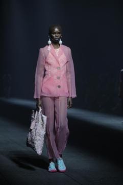 A model wears a creation for the Kenzo mens Spring-Summer 2020 fashion collection presented in Paris, Sunday, June 23 2019. (AP Photo/Michel Euler) (AP) A model wears a creation for the Kenzo mens Spring-Summer 2020 fashion collection presented in Paris, Sunday, June 23 2019. (AP Photo/Michel Euler) (AP)
