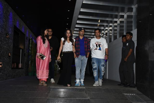 Actor Varun Dhawan with his girlfriend Natasha Dalal, actor Varun Sharma and producer Dinesh Vijan with his wife Pramita Tanwar seen outside a restaurant in Mumbai's Bandra. (IANS) Actor Varun Dhawan with his girlfriend Natasha Dalal, actor Varun Sharma and producer Dinesh Vijan with his wife Pramita Tanwar seen outside a restaurant in Mumbai's Bandra. (IANS)