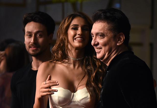 Indian Bollywood actors Tiger Shroff (L), Disha Patani (C) and producer Sajid Nadiadwala (R) attend the premiere of Hindi film Bharat in Mumbai on June 4, 2019. (AFP) Indian Bollywood actors Tiger Shroff (L), Disha Patani (C) and producer Sajid Nadiadwala (R) attend the premiere of Hindi film Bharat in Mumbai on June 4, 2019. (AFP)