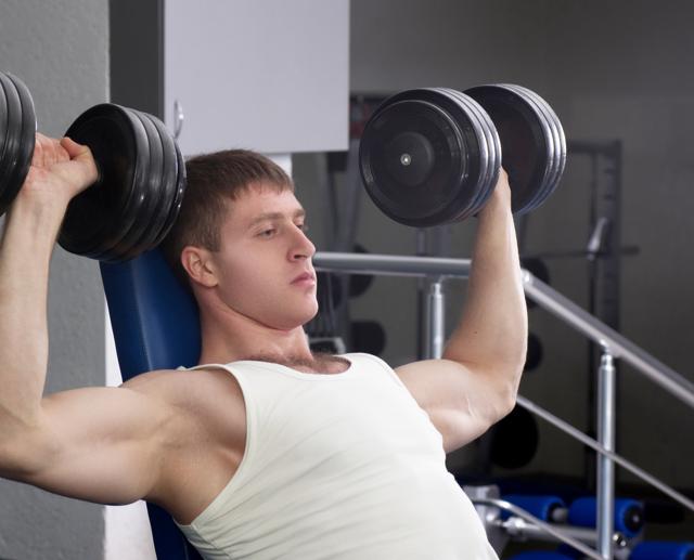 For the upper body exercises like dumbbell press keep the repetitions between 10 to 12 (Shutterstock) For the upper body exercises like dumbbell press keep the repetitions between 10 to 12 (Shutterstock)