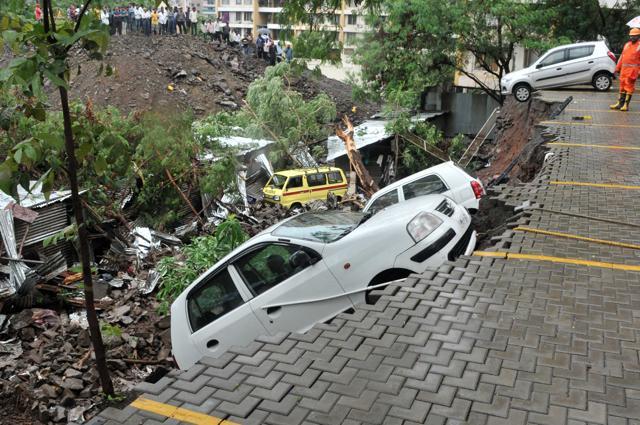 Wall collapse at Alcon Stylus at Kondhwa in on Saturday, June 29. (HT PHOTO)