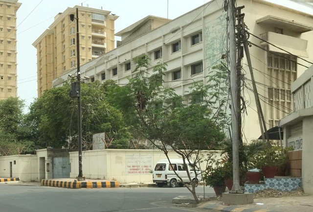 India House is the exception in a happening part of Karachi, and at night, no lights can be seen in the six-storey building, giving it a haunted look. (HT Photo) India House is the exception in a happening part of Karachi, and at night, no lights can be seen in the six-storey building, giving it a haunted look. (HT Photo)