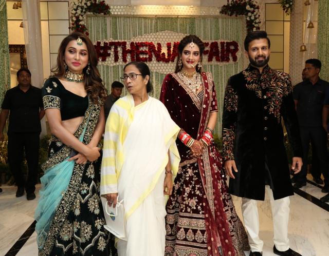 West Bengal Chief Minister's Mamata Banerjee and Trinamool Congress MP Mimi Chakraborty at the wedding reception of Nusrat Jahan and Nikhil Jain in Kolkata on July 4, 2019. (IANS) West Bengal Chief Minister's Mamata Banerjee and Trinamool Congress MP Mimi Chakraborty at the wedding reception of Nusrat Jahan and Nikhil Jain in Kolkata on July 4, 2019. (IANS)