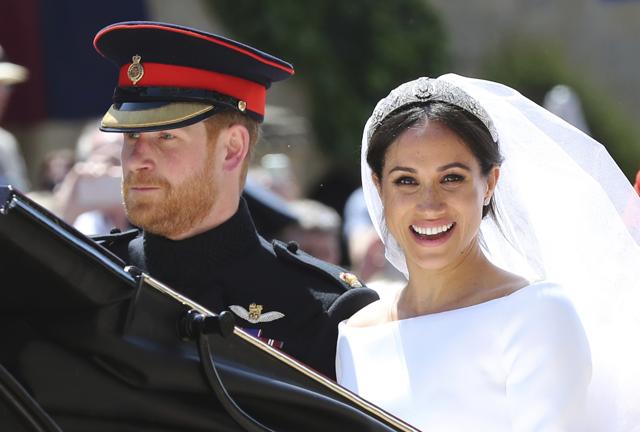 Prince Harry and Meghan Markle at their wedding. (AP) Prince Harry and Meghan Markle at their wedding. (AP)