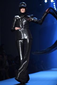 A model presents a creation by Jean Paul Gaultier during the Women's Fall-Winter 2019/2020 Haute Couture collection fashion show in Paris, on July 3, 2019. (Photo by CHRISTOPHE ARCHAMBAULT / AFP) (AFP) A model presents a creation by Jean Paul Gaultier during the Women's Fall-Winter 2019/2020 Haute Couture collection fashion show in Paris, on July 3, 2019. (Photo by CHRISTOPHE ARCHAMBAULT / AFP) (AFP)