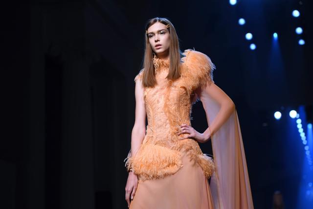 A model presents a creation by Jean Paul Gaultier during the Women's Fall-Winter 2019/2020 Haute Couture collection fashion show in Paris, on July 3, 2019. (Photo by CHRISTOPHE ARCHAMBAULT / AFP) (AFP) A model presents a creation by Jean Paul Gaultier during the Women's Fall-Winter 2019/2020 Haute Couture collection fashion show in Paris, on July 3, 2019. (Photo by CHRISTOPHE ARCHAMBAULT / AFP) (AFP)
