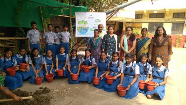 Students of Seva Sadan High School, Ulhasnagar, planted saplings in their school premises recently. (HT Photo) Students of Seva Sadan High School, Ulhasnagar, planted saplings in their school premises recently. (HT Photo)