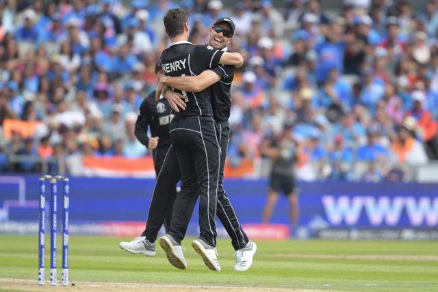 New Zealand's Matt Henry (L) celebrates taking the wicket of India's K.L. Rahul. (AFP) New Zealand's Matt Henry (L) celebrates taking the wicket of India's K.L. Rahul. (AFP)