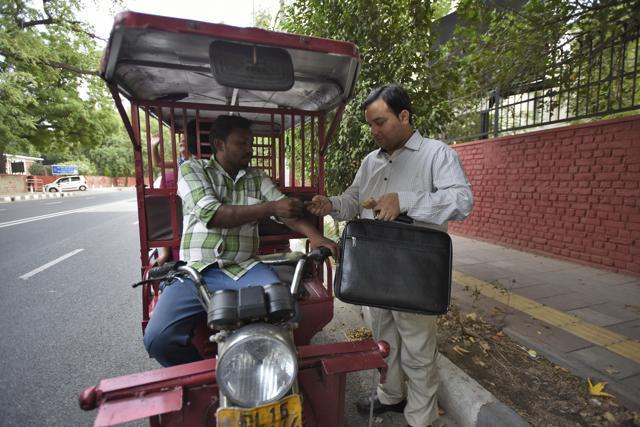 Abhishek Thakur, a visually impaired assistant professor at the department of social work, Delhi University, says he is at times short-changed when he pays people. (Burhaan Kinu/HT PHOTO) Abhishek Thakur, a visually impaired assistant professor at the department of social work, Delhi University, says he is at times short-changed when he pays people. (Burhaan Kinu/HT PHOTO)