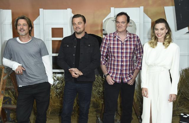 Brad Pitt, from left, Leonardo DiCaprio, Quentin Tarantino and Margot Robbie attend the photo call for Once Upon a Time in Hollywood. (Jordan Strauss/Invision/AP) Brad Pitt, from left, Leonardo DiCaprio, Quentin Tarantino and Margot Robbie attend the photo call for Once Upon a Time in Hollywood. (Jordan Strauss/Invision/AP)