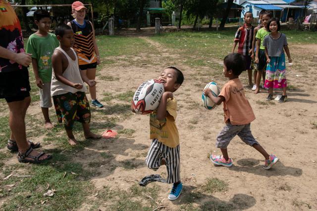 Every Sunday, boys and girls aged five to 18 from Yangon's North Dagon township can be seen playing touch rugby, an incongruous sight in a country where the sport is barely known. (AFP) Every Sunday, boys and girls aged five to 18 from Yangon's North Dagon township can be seen playing touch rugby, an incongruous sight in a country where the sport is barely known. (AFP)