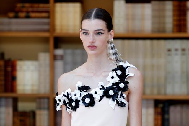 A model presents a creation by designer Virginie Viard as part of her Haute Couture Fall/Winter 2019/20 collection show for fashion house Chanel in Paris. (REUTERS) A model presents a creation by designer Virginie Viard as part of her Haute Couture Fall/Winter 2019/20 collection show for fashion house Chanel in Paris. (REUTERS)