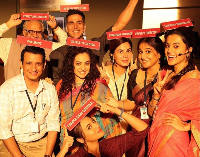 Ahead of MIssion Mangal trailer, the team poses with their designation cards in the film. Ahead of MIssion Mangal trailer, the team poses with their designation cards in the film.