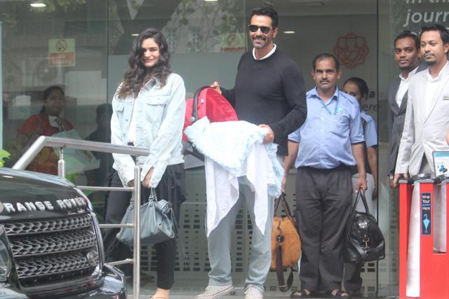 Gabriella Demetriades and Arjun Rampal leave with their newborn son. (Varinder Chawla)