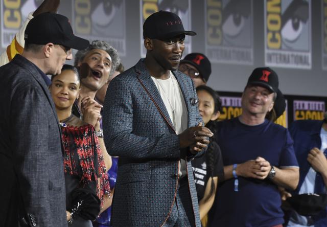 Mahershala Ali, center, wears a hat to promote his new movie Blade at the Marvel Studios panel on day three of Comic-Con International on Saturday, July 20, 2019, in San Diego. (Chris Pizzello/Invision/AP) Mahershala Ali, center, wears a hat to promote his new movie Blade at the Marvel Studios panel on day three of Comic-Con International on Saturday, July 20, 2019, in San Diego. (Chris Pizzello/Invision/AP)