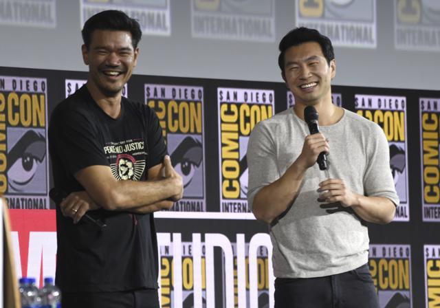 Destin Daniel Cretton, left, and Simu Liu speaks during the Shang-Chi and The Legend of the Ten Rings portion of the Marvel Studios panel on day three of Comic-Con. (Chris Pizzello/Invision/AP) Destin Daniel Cretton, left, and Simu Liu speaks during the Shang-Chi and The Legend of the Ten Rings portion of the Marvel Studios panel on day three of Comic-Con. (Chris Pizzello/Invision/AP)