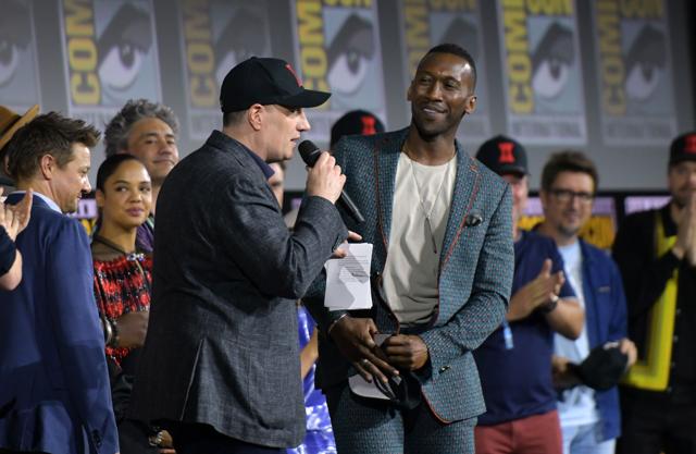 President of Marvel studios Kevin Feige (C) welcomes US actor Mahershala Ali on stage during the Marvel panel in Hall H. (AFP) President of Marvel studios Kevin Feige (C) welcomes US actor Mahershala Ali on stage during the Marvel panel in Hall H. (AFP)