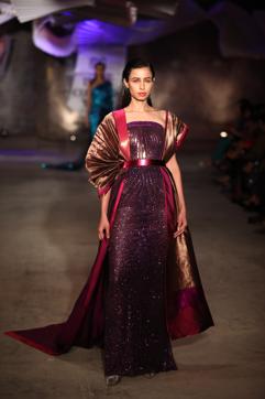 RECEPTION ENSEMBLE: This shimmer dress with Benarasi silk cape and holographic belt can be teamed with minimal makeup for the perfect reception look. (Photo: Raajessh Kashyap/HT)