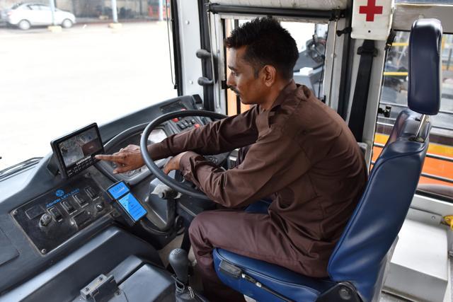 There is a a touch-enabled screen fixed near the driver’s steering which displays a live feed of the rearview camera and cameras inside the buses. (Sanchit Khanna/HT Photo ) There is a a touch-enabled screen fixed near the driver’s steering which displays a live feed of the rearview camera and cameras inside the buses. (Sanchit Khanna/HT Photo )