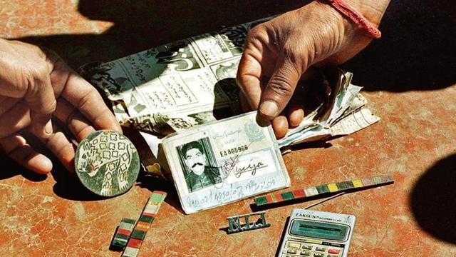 An identity card, a calculator and newspaper seized during the 1999 Kargil war. ((Manish Swarup/Ht archive )) An identity card, a calculator and newspaper seized during the 1999 Kargil war. ((Manish Swarup/Ht archive ))