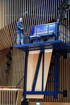 Too reach the keys, pianists need to climb up a steep flight of steel stairs. (AFP File Photo) Too reach the keys, pianists need to climb up a steep flight of steel stairs. (AFP File Photo)