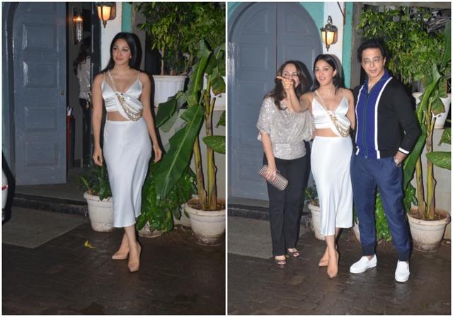 Kiara with her parents. Kiara with her parents.