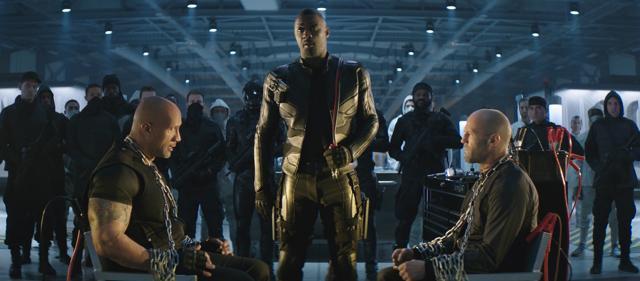 This image released by Universal Pictures shows, foreground from left, Dwayne Johnson, Idris Elba and Jason Statham in a scene from Fast & Furious Presents: Hobbs & Shaw. (AP) This image released by Universal Pictures shows, foreground from left, Dwayne Johnson, Idris Elba and Jason Statham in a scene from Fast & Furious Presents: Hobbs & Shaw. (AP)
