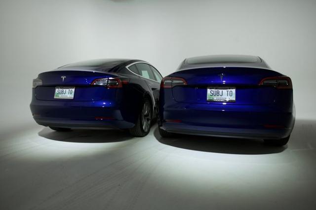 Almost identical cars of twin brothers. Almost identical cars of twin brothers.