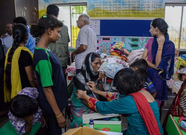 Residents were provided with health services at the PMC-run school. A help camp on social media has been started appealing for donations. (Milind Saurkar/HT Photo)