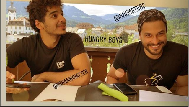 Ishaan Khatter and Kunal Kemmu wait for food.
