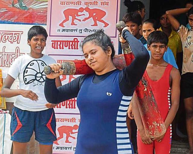 Until last year, only male wrestlers performed the exercises involving maces and clubs. But the tradition was broken this year. (HT Photo ) Until last year, only male wrestlers performed the exercises involving maces and clubs. But the tradition was broken this year. (HT Photo )